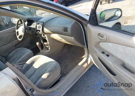 1998 Toyota Corolla Le z USA, uszkodzony, nr VIN 2T1BR18E5WC004581